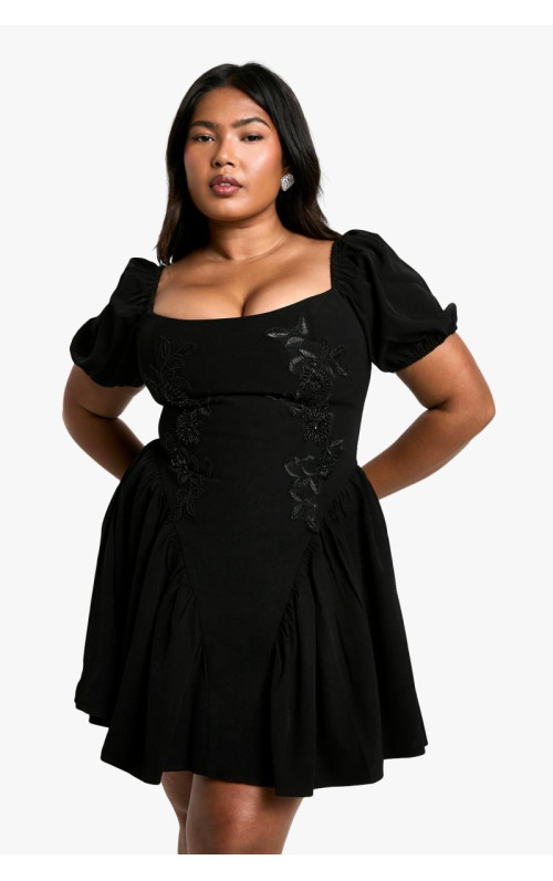 Сукня-комбінезон з пуховими рукавами