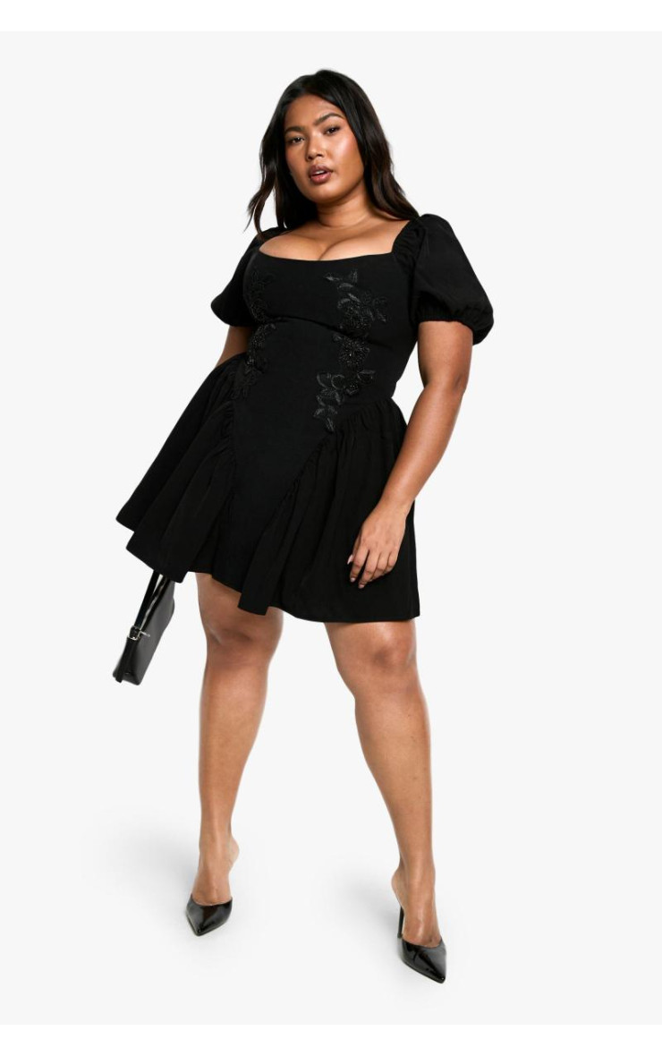 Сукня-комбінезон з пуховими рукавами