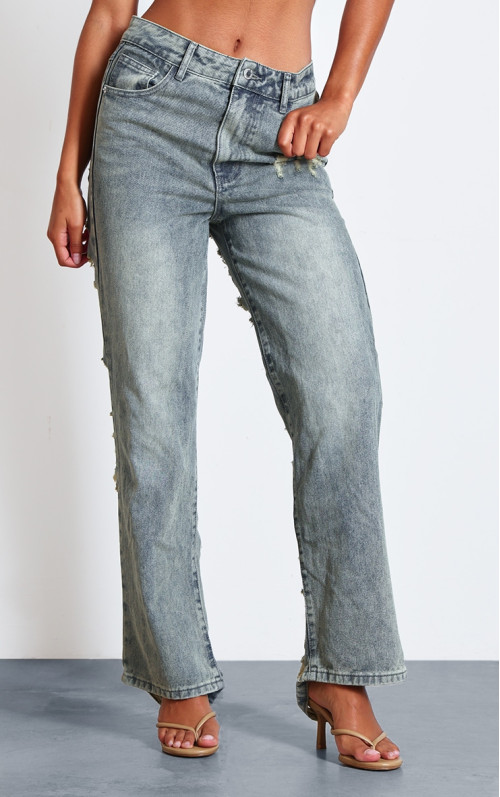 Вінтажні мішкуваті джинси з екстремально пошкодженою спиною