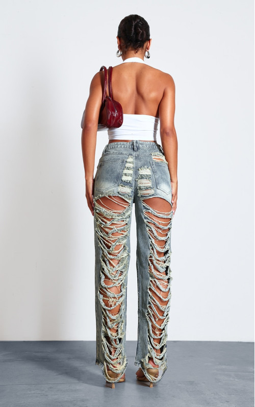 Вінтажні мішкуваті джинси з екстремально пошкодженою спиною