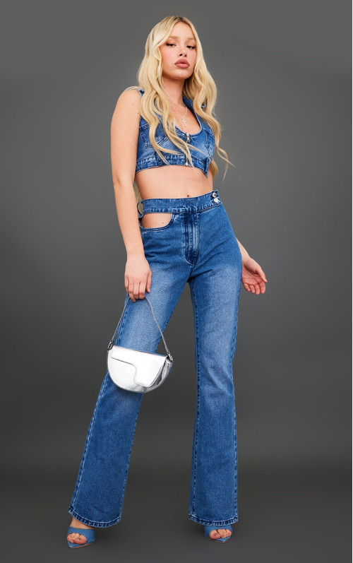 Сині розкльошені джинси з ґудзиками