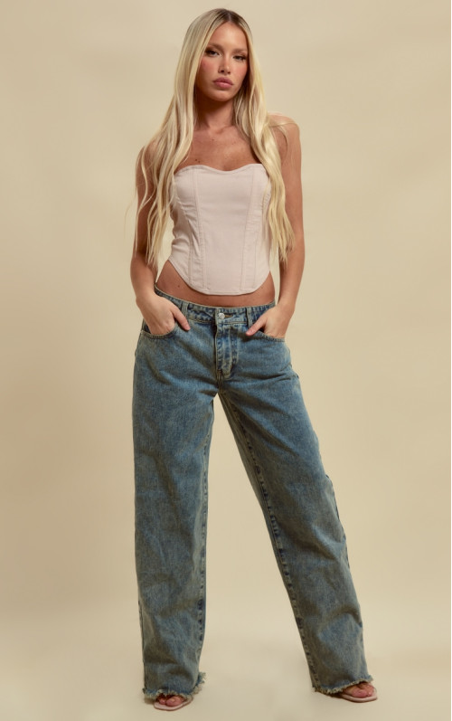 Вінтажні джинси-бойфренди з випраним потертим краєм