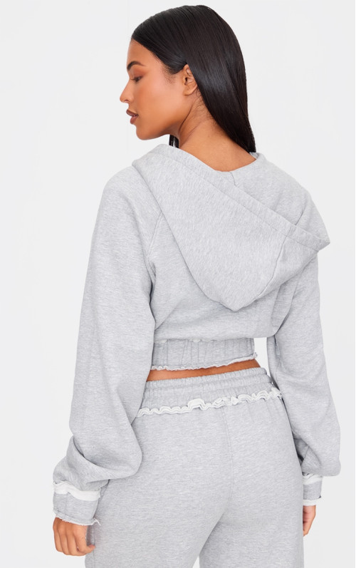 Високий сірий укорочений худі на блискавці зі старим подолом