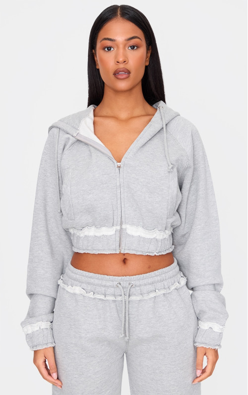 Високий сірий укорочений худі на блискавці зі старим подолом
